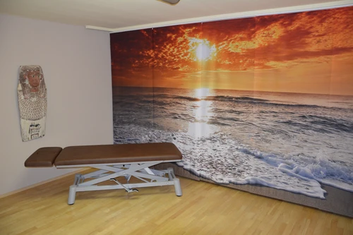 Foto-Schiebevorhang bedruckt mit Sonnenuntergang am Meer als Raumtrenner für eine Praxis